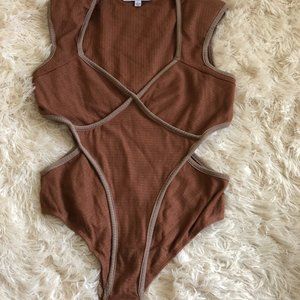 Peek-A-Boo Trimmed Body Suit